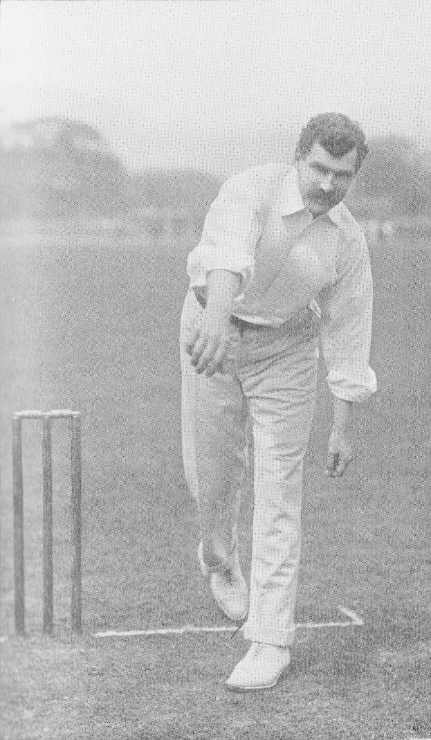 Ein Mann in einem weißen Cricket-Outfit spielt auf einem Feld mit Wickets, Bäumen und Himmel im Hintergrund; der Text "Cricket-Spieler des Jahres" erscheint unten.