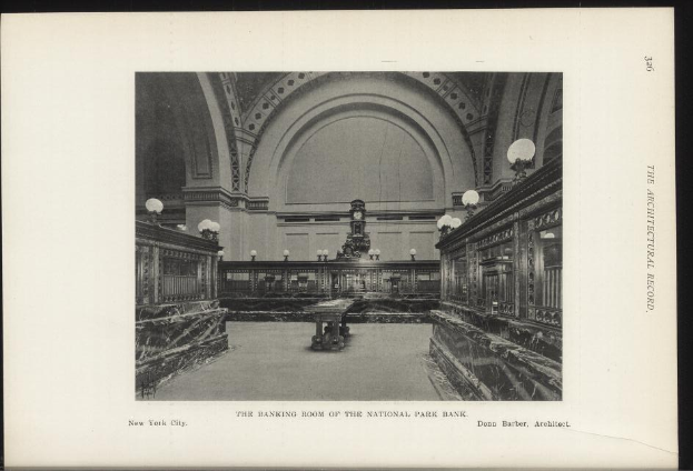 Schwarz-weißes Foto der Geschäftsstelle der National Park Bank in New York City, das Tische, Beleuchtung, eine Wanduhr und Text am unteren Rand zeigt.